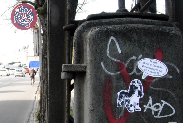 stickupPOETRY: De siger ud med de fremmede... They say, throw out the aliens... Urban-Artivism by DoggieDoe - The Dark Roses - Copenhagen K. Denmark February 2008